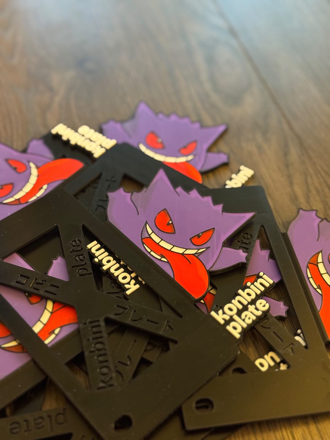 Gengar license plate side frames, 3D printed in purple, red, white and black